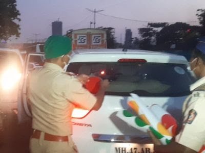 Colour-coded stickers for essential services on vehicles in Mumbai