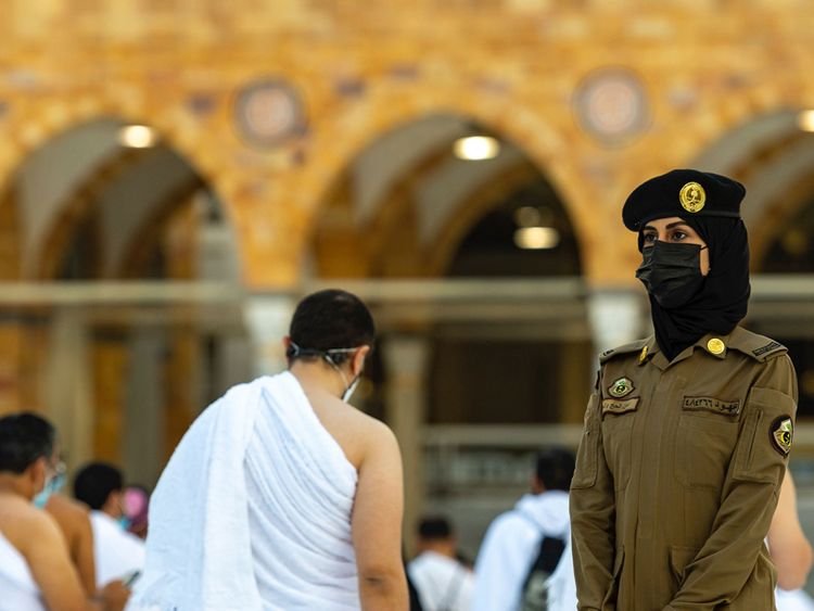 Saudi women stand guard in Mecca during Hajj for the first time